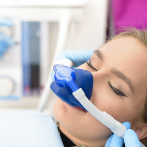 Patient receiving nitrous oxide sedation dentistry