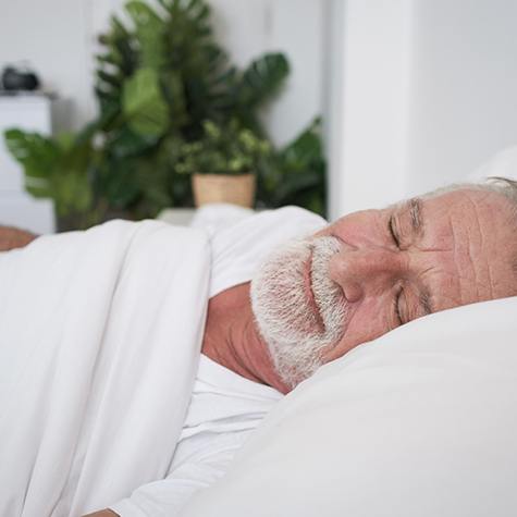 Man sleeping in bed