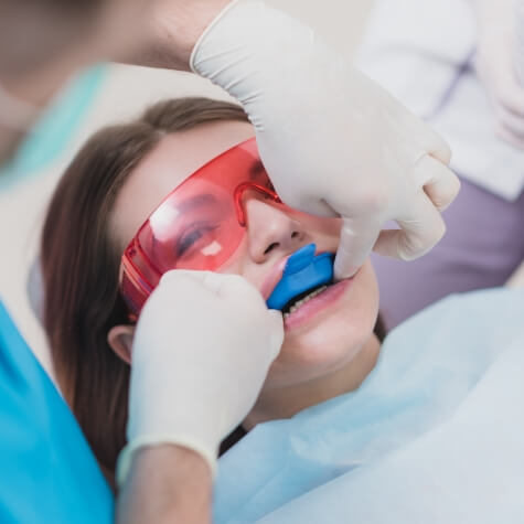 Patient receiving fluoride treatment