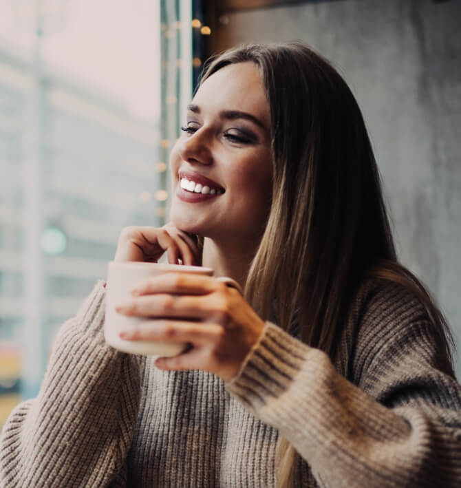 Woman with gorgeous smile after cosmetic dentistry