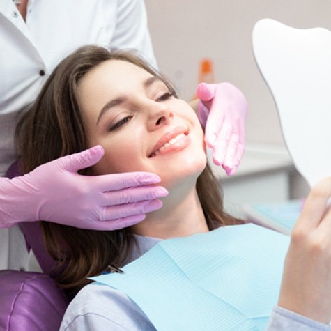 A young woman who just received cosmetic dentistry