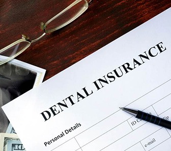 dental insurance form on table