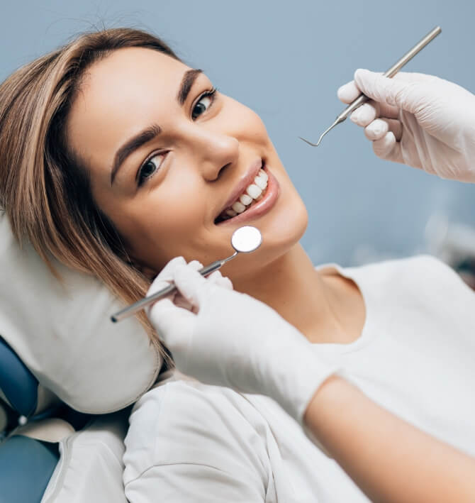 Woman smiling during periodontal disease treatment