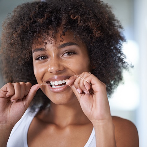 Patient in McKinney recovering with dental implants