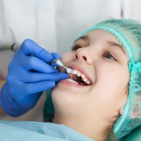 Patient receiving fluoride treatment