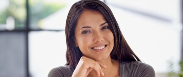 Woman with gorgeous smile after cosmetic dentistry