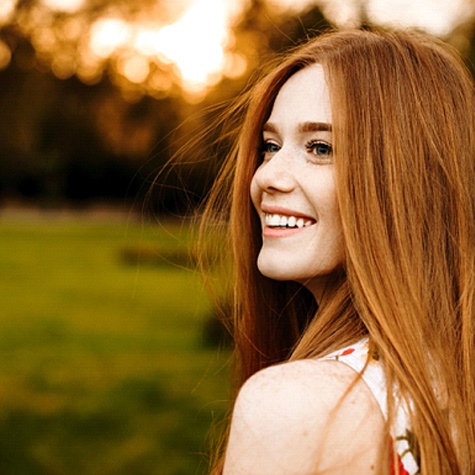 woman smiling with veneers in McKinney